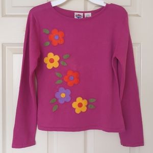 Girl's Knit sweater with embroidered flowers.